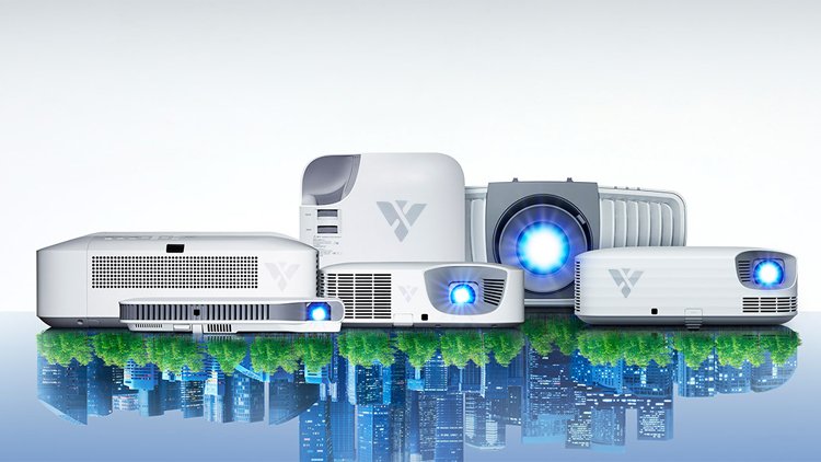 Lineup of modern LED projectors emitting blue beams with Vertx logo, designed for high-resolution visual.