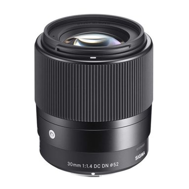 Sigma 30mm f/1.4 prime lens for mirrorless cameras with matte black finish, perfect low-light photography gear UAE